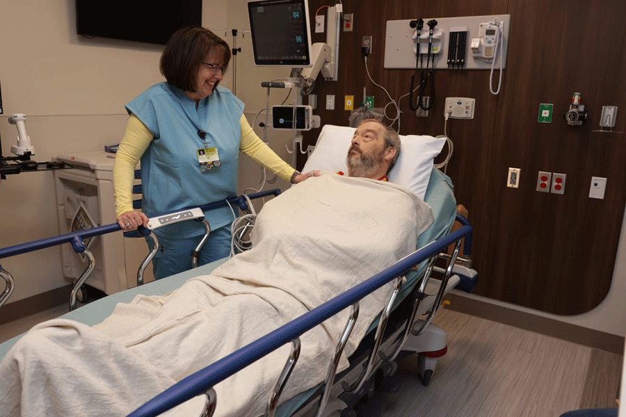 Stephen Black (right), of Mounty Airy, talks with Tina Johnson (left), nurse director of Emergency Services at Northeast Georgia Medical Center Gainesville, inside the hospital’s new emergency department. Black was the first patient at the emergency department in the new Green Tower, arriving at 6:47 a.m. on Saturday, Feb. 8.